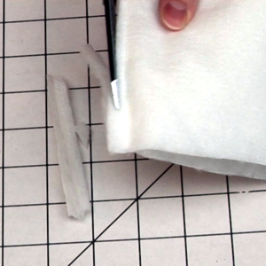 Trim the cuff's seam allowances trim seam allowances image