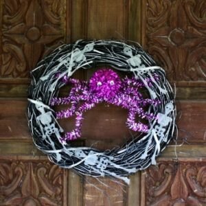 Halloween Wreath With Glow In The Dark Skeletons image