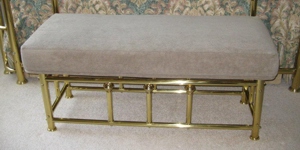 Upholstered Bench with Brass Frame image