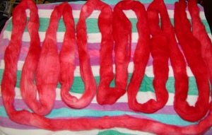 Wool roving dyed red