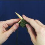 Knitting green yarn image